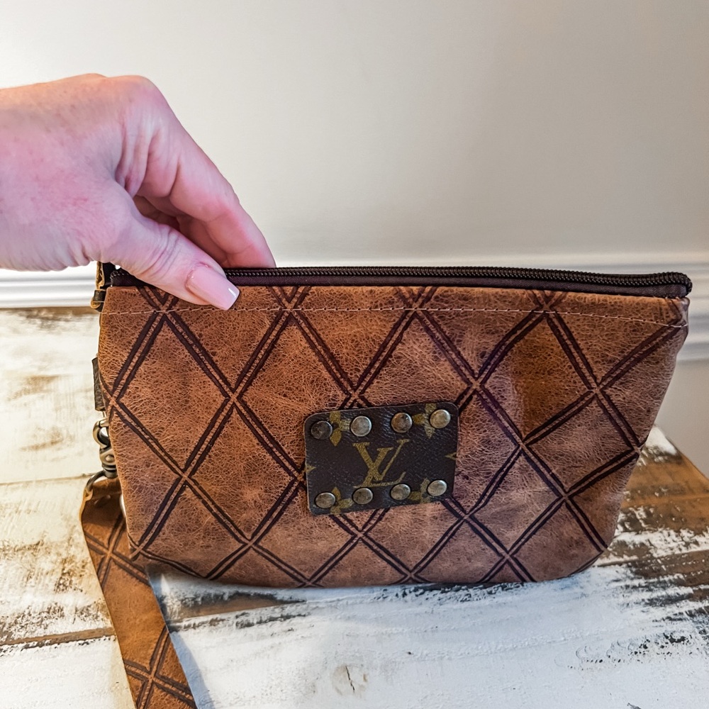 Brown wristlet with Repurposed LV logo patch